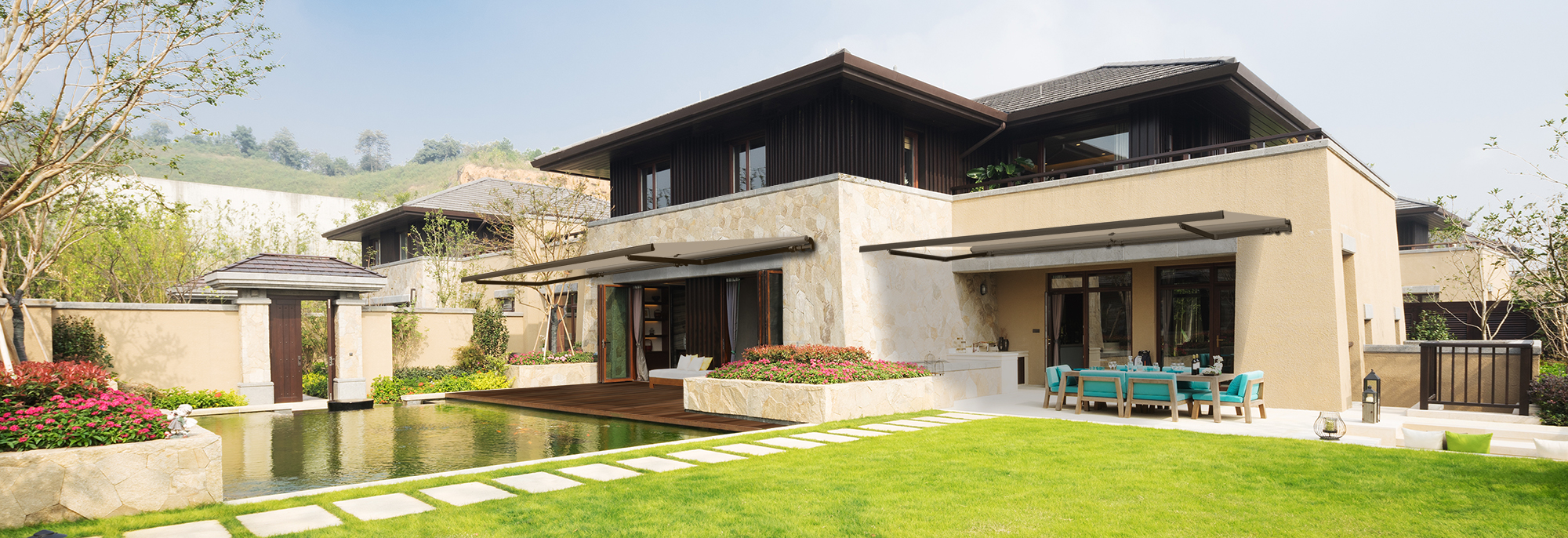 modern builing near meadow in blue sky